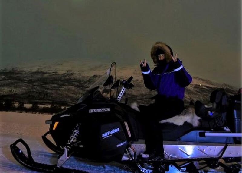 Hunting for the Aurora Borealis Riding snowmobile in Abisko, Sweden